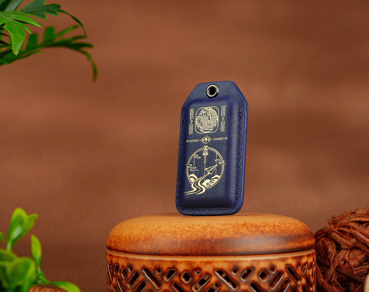 Safe Travels Amulet back with peace bell and paper airplane design