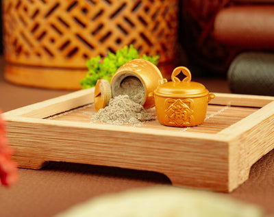 Golden Fortune Pot opened with temple incense ash